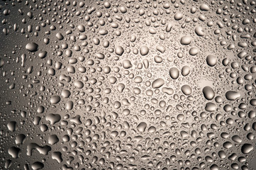  water drops on glass on background