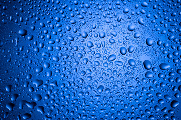  water drops on glass on background
