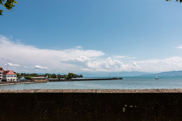 Little spit of land into the water and a little village