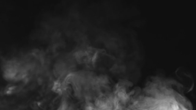 swirling white smoke on a black background