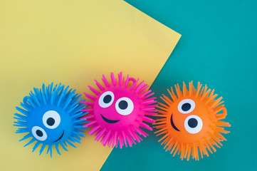 3 PUFFER BALLS PLASTIC SOFT TOYS BACKGROUND
