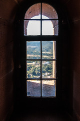 Fototapeta na wymiar Windows of an old castle made of sandstone