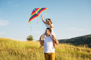 dad and daughter enjoy nature