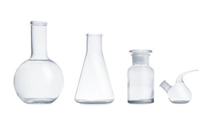 Set of empty laboratory glassware on white background
