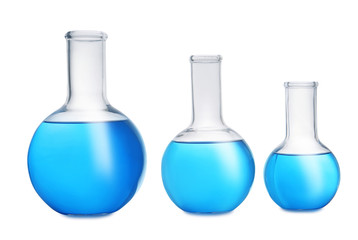 Florence flasks with blue liquid on white background. Laboratory glassware