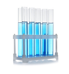 Test tubes with blue liquid on white background. Laboratory glassware