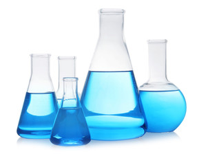 Florence and conical flasks with blue liquid on white background. Laboratory glassware