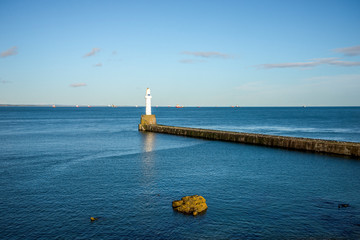 A view to South Breakwater lighthouse and North Sea landscape at Aberdeen, Scotland
