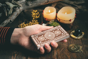 Fortune teller woman reading a future by tarot cards concept.