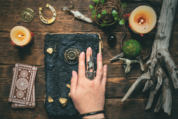 Fortune teller woman reading a book of future concept.