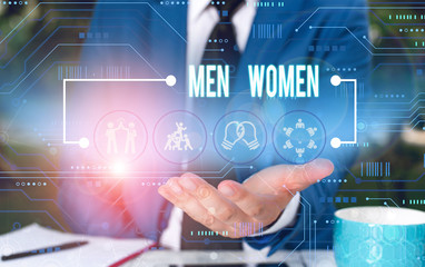 Text sign showing Men Women. Business photo showcasing The state where in a boy or a girl turns to be a mature adult Male human wear formal work suit presenting presentation using smart device