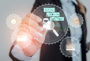 Writing note showing Business Processes Automation. Business concept for performed to achieve digital transformation Woman wear formal work suit presenting presentation using smart device