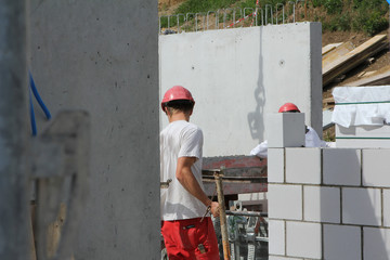 Hard working people at construction site