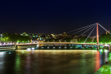 Fototapeta na wymiar View of Suspension Bridge, Saone River at night, Lyon, France