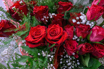 Bouquet of roses and other flowers close-up selective focus