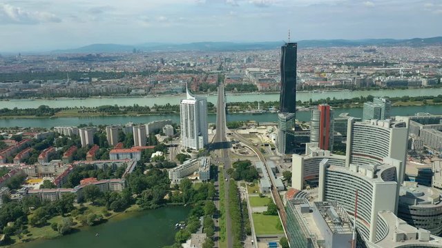 vienna city river coastline modern downtown sunny day aerial panorama 4k austria