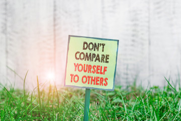 Conceptual hand writing showing Don T Compare Yourself To Others. Concept meaning Be your own...
