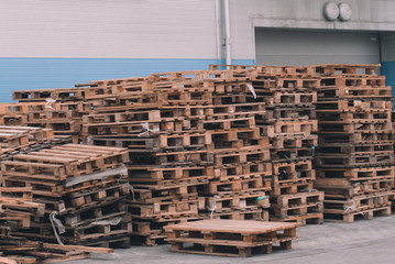 Cargo pallets. Unloading goods in a supermarket.