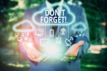 Writing note showing Don T Forget. Business concept for used to remind someone about important fact...