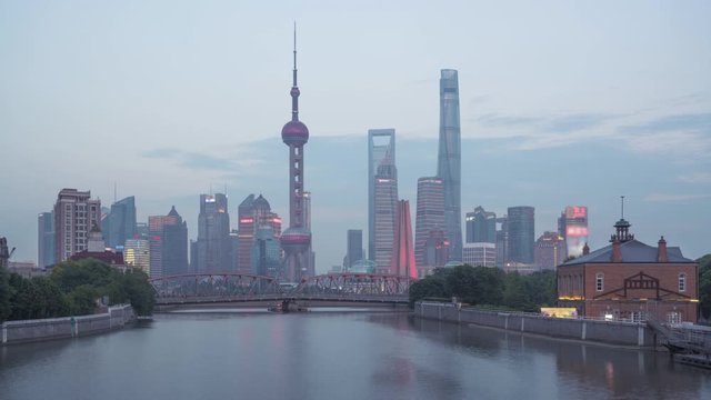 time lapse of sunset, Shanghai skyline and Waibaidu bridge, China