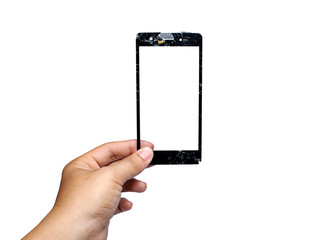 The hand of a man holding a phone with a broken face on a white background