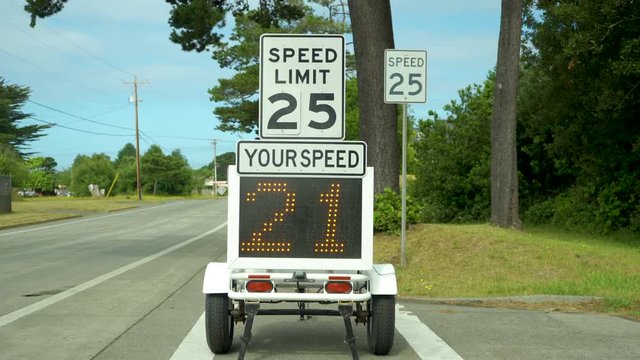 Speed limit sign showing speed to slow traffic down on highway 