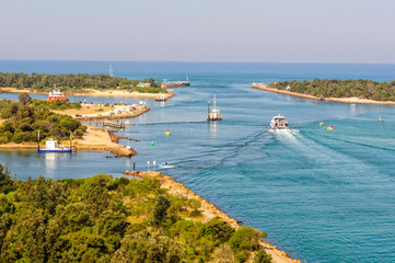 View of the Bullock and Rigby Islands and a man-made entrance into the Gippsland Lakes from the Lake Entrance Lookout - Lakes Entrance, Victoria, Australia © lkonya