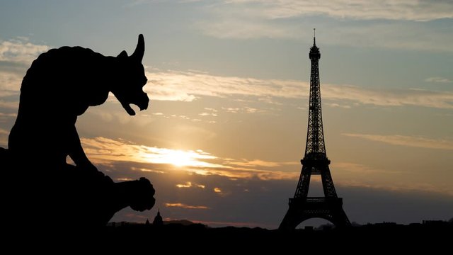 Notre Dame Gargoyle or Chimera Overlooking Paris with Eiffel Tower, Time Lapse at Sunrise with Skyline of City and Colorful Clouds, France