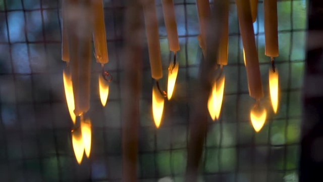 reflecting candles on water at the alter in a church