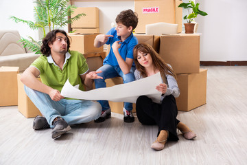 Young family moving to new flat