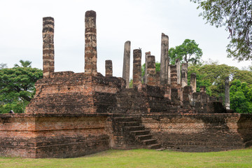Fototapeta premium Sukhothai, Thailand - Apr 07 2018: Wat Mai Monastery in Sukhothai Historical Park, Sukhothai, Thailand. It is part of the World Heritage Site- Historic Town of Sukhothai and Associated Historic Towns.