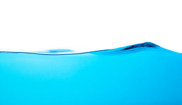 Blue water splash wave surface with bubbles of air on white background.