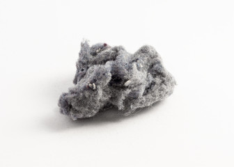 laundry lint on white background