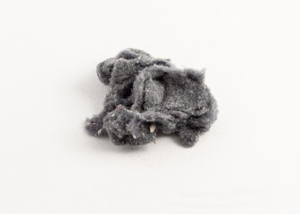 laundry lint on white background