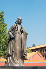 Naklejka premium Lumbini, Nepal - Dec 09 2017: Xuanzang Statue at Chinese Buddhist Monastery in Lumbini, Nepal. Lumbini, the Birthplace of the Lord Buddha and The Eight Great Places.