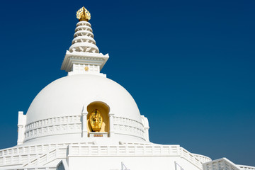 Lumbini, Nepal - Dec 10 2017: World Peace Pagoda in Lumbini, Nepal. Lumbini, the Birthplace of the Lord Buddha and The Eight Great Places.
