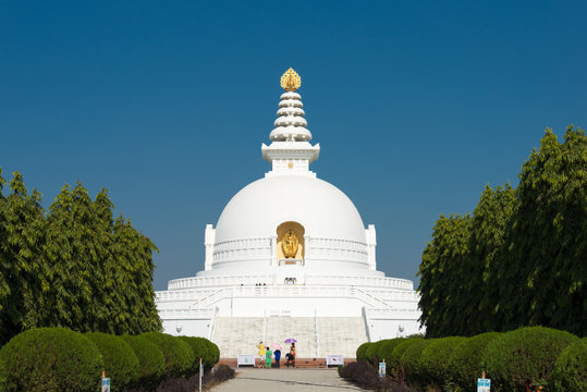 Lumbini, Nepal - Dec 10 2017: World Peace Pagoda in Lumbini, Nepal. Lumbini, the Birthplace of the Lord Buddha and The Eight Great Places. Stock Photo | Adobe Stock