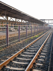 Fototapeta na wymiar Train tracks at the train station