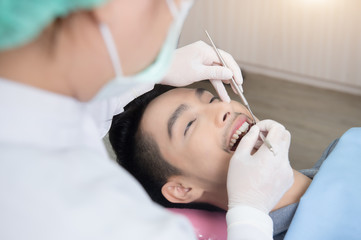 Obraz na płótnie Canvas Dentists with a patient during a dental intervention. Dentist Concept