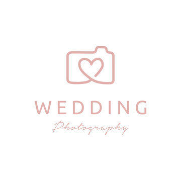 Camera and Heart symbol for Wedding photography logo