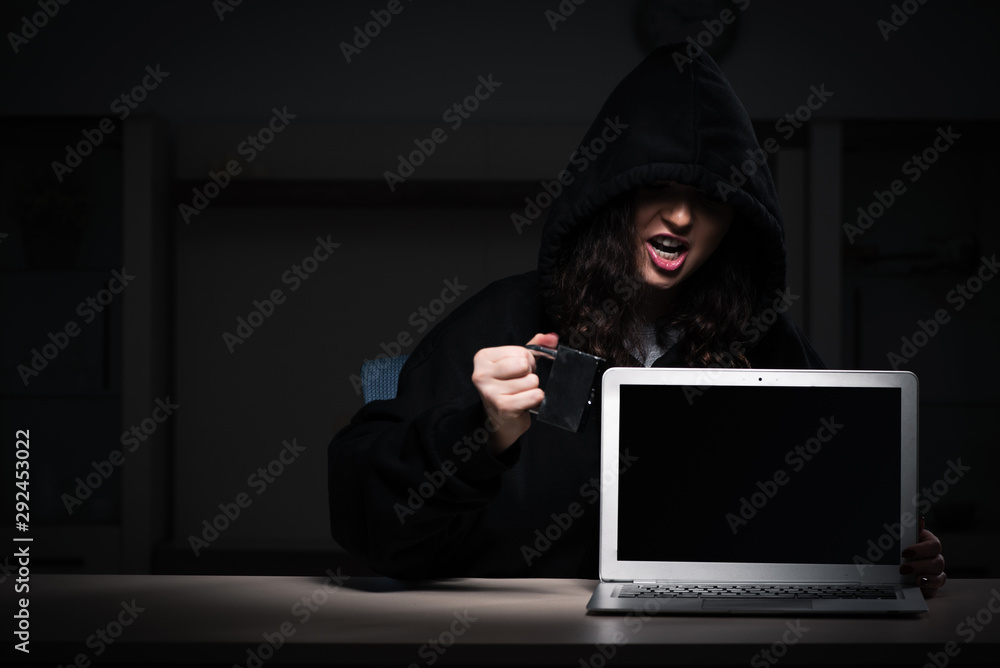 Poster female hacker hacking security firewall late in office