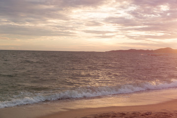 Fototapeta na wymiar Sunset sea beach. Clouds on the sky