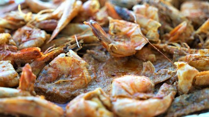 close up view on fried shrimp on the grill