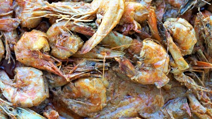 close up view on fresh fried shrimp in the market