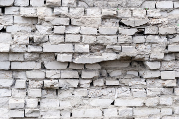 Obraz premium broken old brick wall background