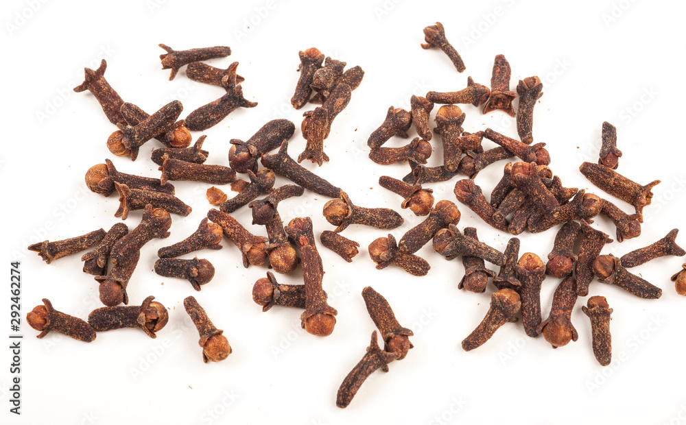 Wall mural dry cloves on white background