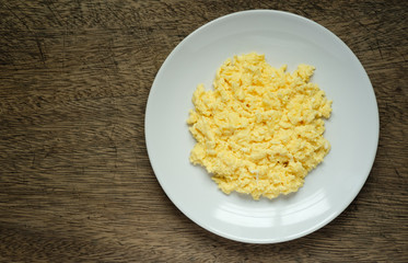 Scramble on a white plate with copy space