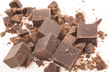 Broken chocolate on white background