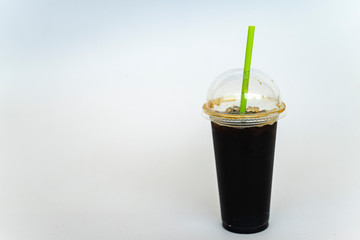 Coffee in ready-to-eat plastic cups on a white background