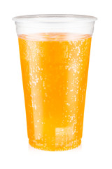 Orange carbonated drink with ice in a plastic cup isolated on white background